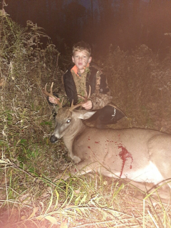 Clay Biggs of Tawas City got a nice 8 point in Grant Township!  Clay Bigs isnt old enough to enter our contest but his proud papa sent us in a picture of Clay from Tawas Coty woth his 8 point Buck  Congrats to Clay from Carroll Broadcasting.