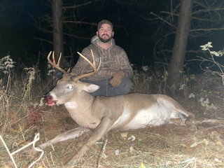 Jacob Farrand of Hale With His 8 point!  Sat for 4 hours along a creek without a deer sighting then about an hour before dark this guy came by trailing a doe, hit the grunt call a few times and he came right in looking for a fight, shot with my Darton Compound at 35 yards and the rest is history!
