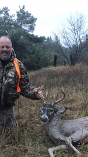 Brad Johnson from Tawas City with his 8 pointer!