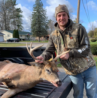 Justin Blust of Tawas City with a nice 9 point taken in Alabaster Twp.