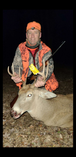 Richard Collins of Tawas City With His 8 Point!