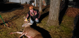 Brad Taylor of Rogers City with his Presque Isle 8 point!