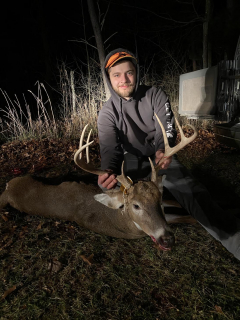 Steve Ulman of Tawas City With his 8 point!