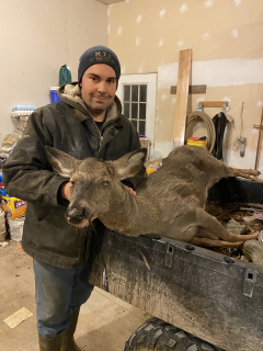 Christopher Schalk of Hillman with his Doe!