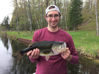 Adam Weiss of Frankenmouth withhis Large Mouth Bass