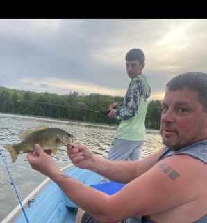 Michael Walker of Harrisville - Small Mouth Bass! Having fun fishing with my son!