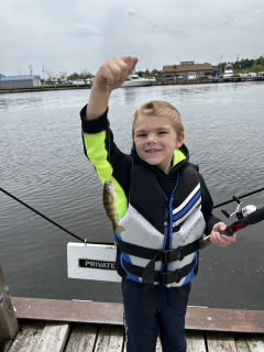 Barb Hoepfner of Oscoda First Perch of the year with her Grandson!