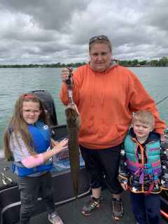 Trisha Demanski and the kids with their Pike