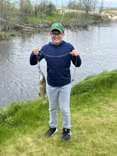 Casey Sweet's son from Pinconning with his Smallmouth Bass