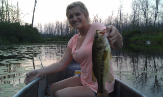 Taylor Loew of Tawas City and her Largemouth Bass
