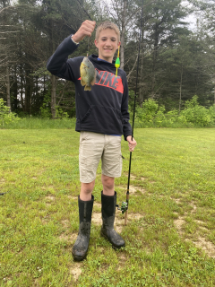 Kevin Loew from Tawas City and his Sunfish