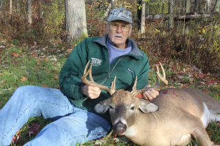 Roger Becker of Walled Lake Bagged his 8 point in Arenac County!  I thought I entered before, but haven't seen my photo on board. I realized I made a mistake on date shot. I entered Nov. 21, but shot it on Oct. 21. 