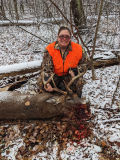 Tiffany Heckman of West Branch with her Prescott 7 point!  He came in hot, chasing a doe at 10:24am opening day. At 10:25am he stopped at 76 yards, he layed where he stood.