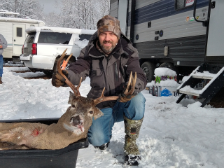 Aaron Buza of Alpena with his 8 point Alcona Buck!  Fantastic buck  This just might be my luckiest season ever. This was the only deer I saw all day. He came in during the evening and made a scrape for a few minutes, which felt like hours. He finally gave me a shot and I took it. What an unbelievable buck!