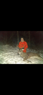 Rainelle Boettner of Whittemore with his Iosco County 10 point!  I also bow hunt and had passed on a couple of smaller bucks during bow season a six and eight. Wasnâ??t sure if Iâ??d see them again during rifle so itâ??s just another cold day sitting and this guy just walked up out of the swamp from nowhere. But he never gave me a shot for what seem an eternity as there where does moving all around in afternoon as well, until he was starting to leave and then I had to whistle at him and he turned and stopped. And of course I did all this while not being able to breathe because of how big he was .Rest is history! My biggest buck ever!!!! 