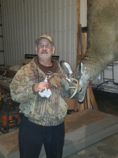 Paul Schalk of Rogers City with his 8 point!