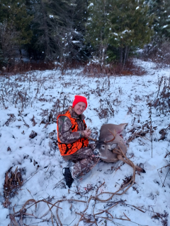 Lillian Bigham of Lincoln with her 8 point bagged in Harrisville!