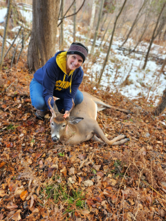 Debra Ludwiczak-Henry of Alpena bagged a 4 point in Black River!