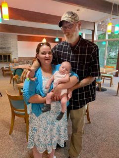 Brandy & Hager Fletcher of Oscoda! My love and I with our first born grandbaby at our daughter's wedding ???? 