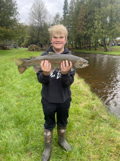 Michael Johnson from Tawas City with his Steelhead from the East Branch AuGres River!