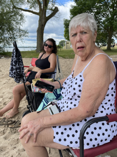 Colleen Roulo with Mom Roberta Roulo.  My 80 yr old Mother at the East Tawas Beach in the summer of 2022. She is the best mom ever.