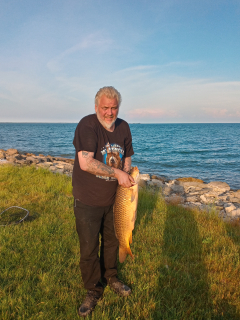 Marc Lafayette of Tawas cought a Big sucker in Tawas