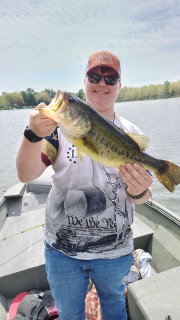 Lane Guoan of Twining with his Bass Caught in Manistee