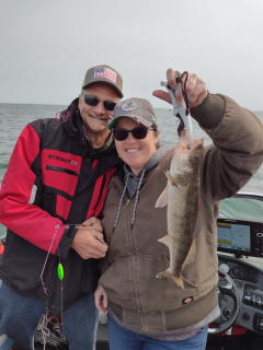 Tiffany Bischoff of Tawas City with a Tagged Walleye caught in AuGres!