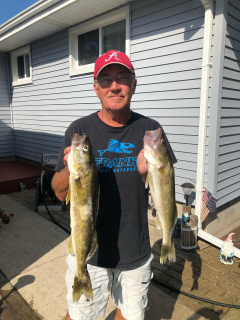 Kevin Cowel of Oscoda with his Walleye caught in Saginaw Bay!
