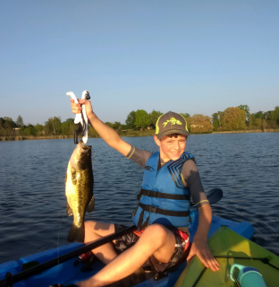 Raymond Darabos of Sterling with his Large Mouth Bass caught in Long Lake!