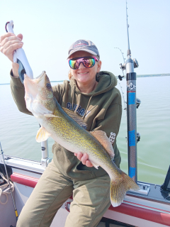 Mae Delaney of Rose City with a nice Walleye caught on The St. Mary's River!