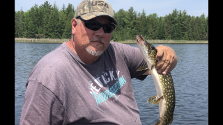 Brian Jennings of Hale with his Northern Pike caught in Loud Dam Pond!