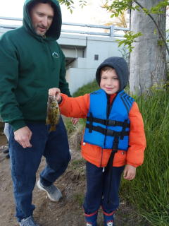 Joey Kimsel of Oscoda with Corbin!  Corbin loves to fish on the Ausable River...Rock Bass!