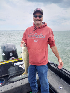 Tim Bishoff of Tawas City with a Walleye caught in AuGres!