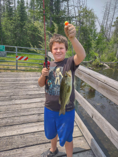 Guage Geddert of Barton City displays his catch!  Nice Bass Guage.