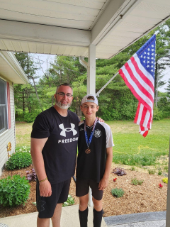 Caleb Conrad of East Tawas with Dad Doug Conrad!  Proud to be your son! 