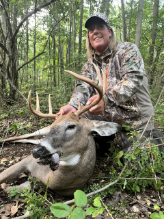 Renee Alfaro of Peck bagged her 8 point in Sanilac County.   We had been watching him all summer on camera. The morning hunt only provided small bucks and then around 5:45 pm he came in and was eating at some apple trees. I took the broadside 20 yard shot and he fell less then 40-50 yards from me. No tracking needed!