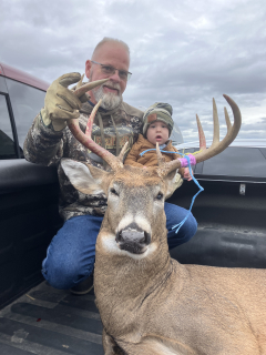 Neal Munsey and grandson Cooper Juillett from prescott bagged a real nice 9 point in Ogemaw County!