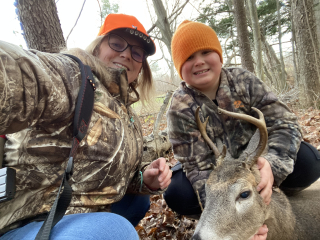 Sherry Flemington from Caro bagged her5 point in Caro!   I was hunting with my 9 year old Grandson and he definitely wanted me to harvest a buck. I decided to shoot at it and missed the first time. Second shot we got it. Then my Grandson tracked it for me. Great memories 