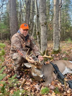 Dave Crouterfield from Standish Bagged his 8 point in Kalkaska!    I could hardly see the deer sneaking thru, but when he stuck his head out of the brush I had about 5 seconds to pull the trigger. It happened so fast!