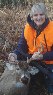 Debra Ludwiczak-Henry from Alpena bagged an 8 point in Black River!
