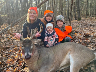 LeAnn O'neil from West Branch bagged an 8 point in Ogemaw County!  : Memories made with g-babies ......tracking 40 yards, found piled up behind log 