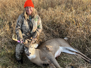 Stacey Deel from Sterling bagged a 6 point in ogemaw County!  Sitting with the hubby and we had several deer coming out at daylight, this fella came in and my husband said “it’s a shooter, get ready , got him in my sights and shot, he ran about 30 yards and layed down. Spread on him is 16”, I was one happy hunter 