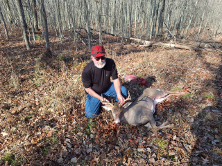 Keith Frank from East Tawas  bagged a 7 point in Reno Twp.  I slept in so I didn't get to my blind until 11:00 am. I was texting my wife at 11:20 when he came in chasing three does. He stopped about 90 yards out in front of me and he turned and looked right at me. I was hunting alone and didn't relish the thought of tracking him so I aimed for his neck. I was a little high and shot him between the eyes ????