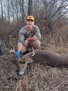 Andrew Blust from East Tawas bagged an 8 point in Wilber Twp.   I rattled & grunted and it wasn't three minutes later he came in around 4:30. I shot & he ran approximately 30 yards & dropped. 