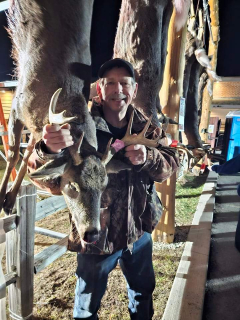 Harry Henry from Alpena Bagged his 9 point in Black River!