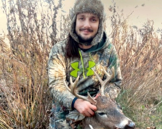 Donald Gusa from Reese bagged an 8 point in Huron County!