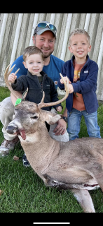 Macy mcCracken from Bad Axe Pictured with a nice 8 point!