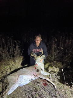 Angela Chrivia of Whittemore bagged her 8 pointer in Sherman Township.