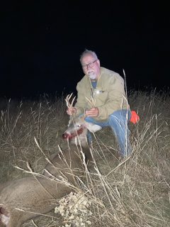 Ed Crainer from Whittemore with his Burleigh Township 8 Point!